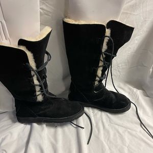 UGG BOOTS. Black suede lace up.